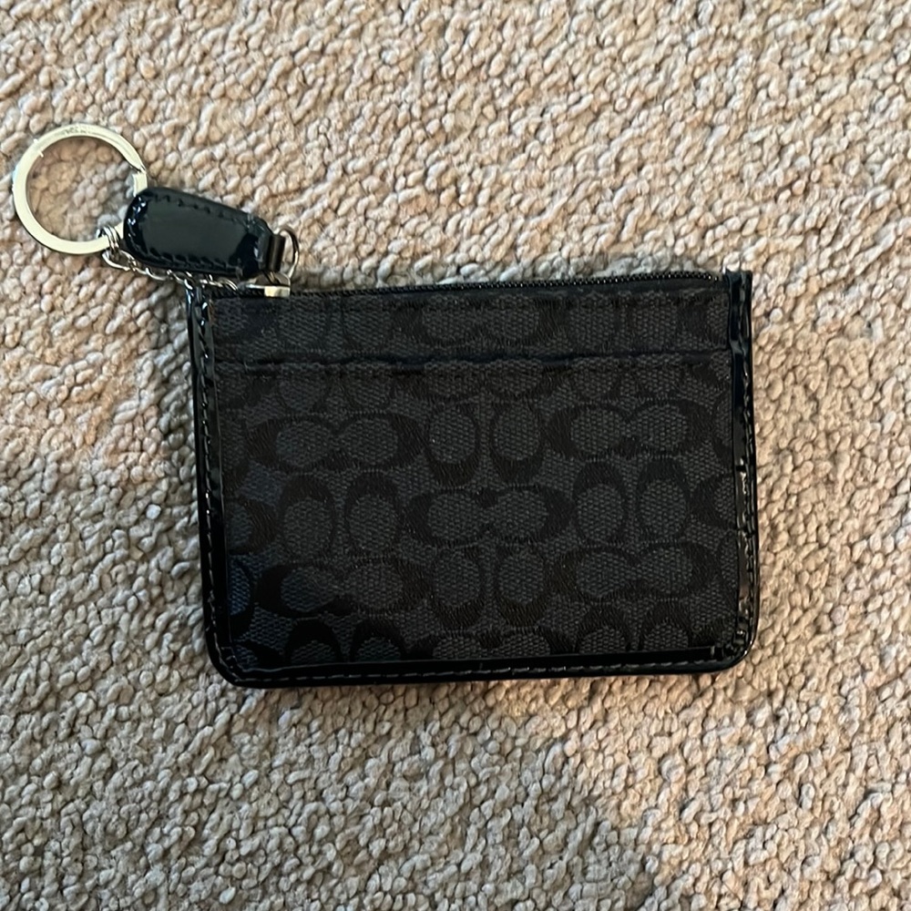 Brand new woman’s coach wallet black.